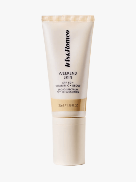 Iris & Romeo Weekend Skin SPF 50 + Vitamin C + Glow in branded tube component on a light gray background